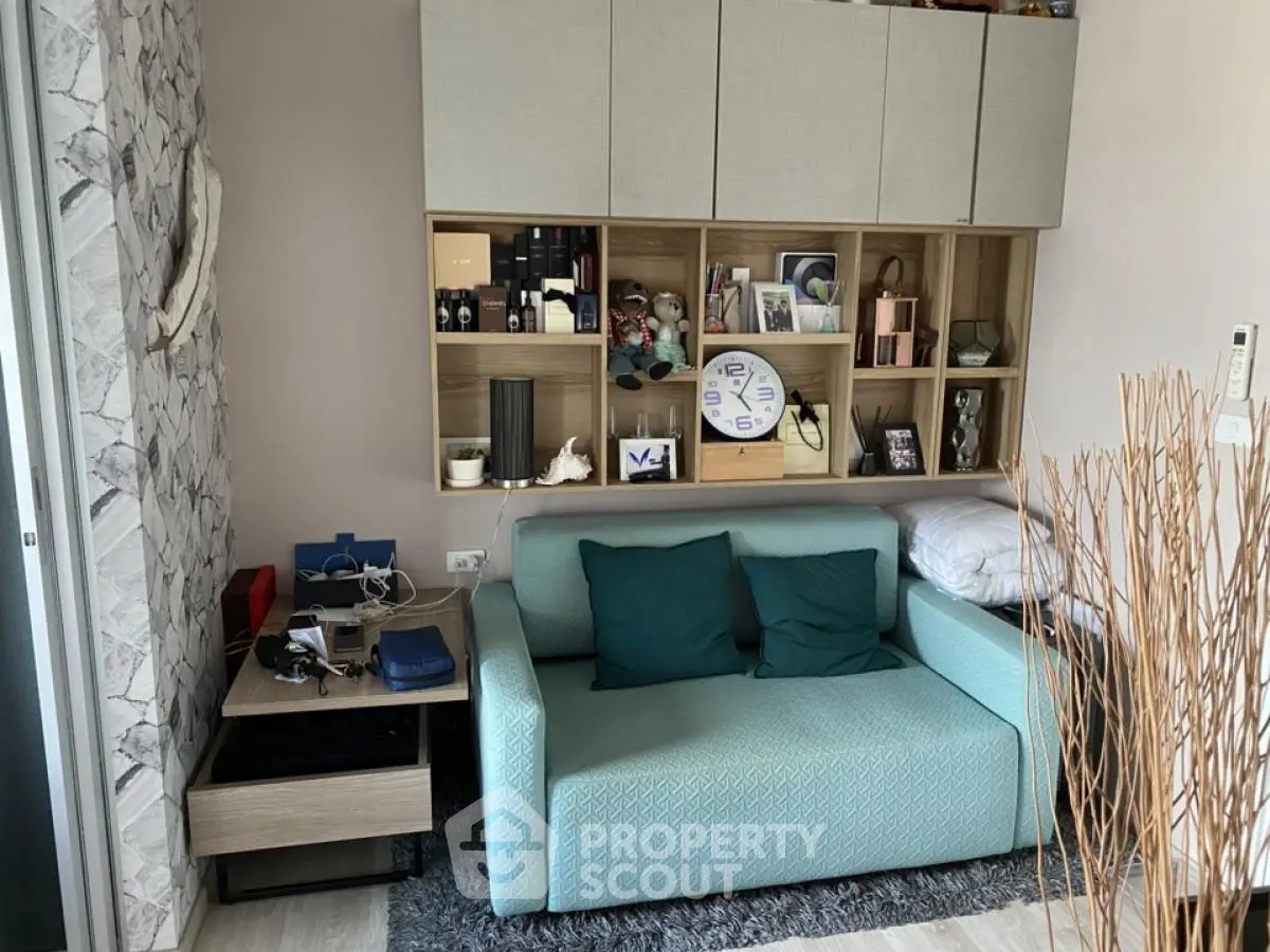Cozy living room with modern sofa and decorative shelving