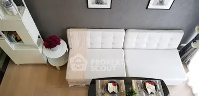 Modern living room with stylish white sofa and elegant decor