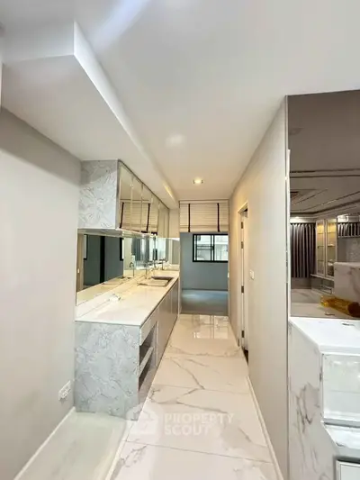 Modern bathroom with marble finishes and sleek design