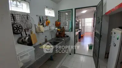 Spacious kitchen with open layout and modern appliances