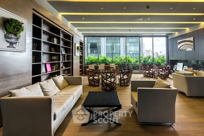 Luxurious modern living room with elegant furniture and city view, perfect for relaxation and entertainment.