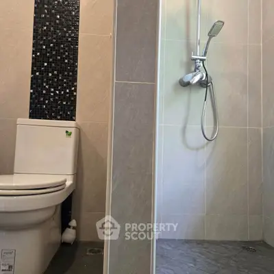 Modern bathroom with sleek shower and stylish tile design
