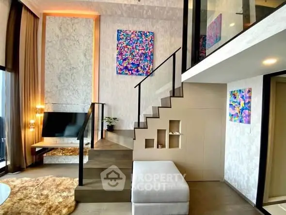 Modern duplex living room with stylish decor and mezzanine level