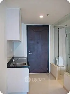 Modern bathroom with sleek design and glass shower enclosure
