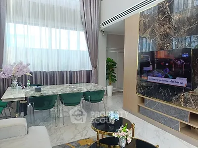 Luxurious modern living room with marble accents and elegant decor