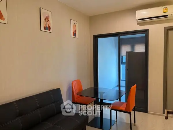 Modern living room with sleek furniture and air conditioning