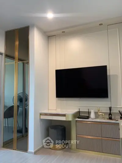 Modern living room with sleek TV setup and elegant decor