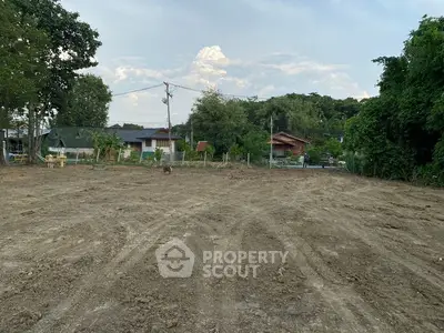 Spacious cleared land plot ready for development in a serene neighborhood.