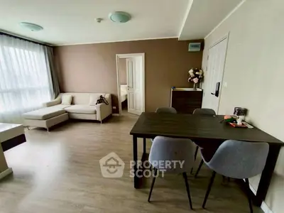 Modern living room with stylish furniture and natural light