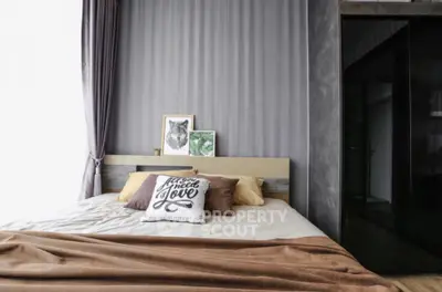 Cozy bedroom with stylish decor and natural light