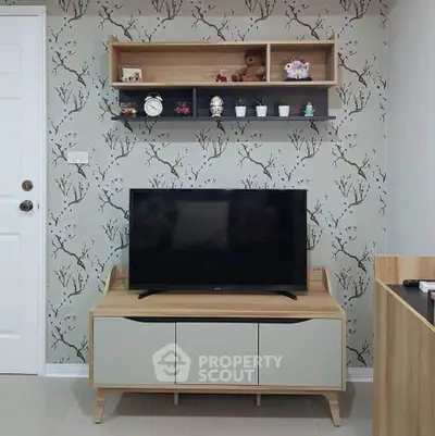 Modern living room with stylish TV stand and decorative wall shelves