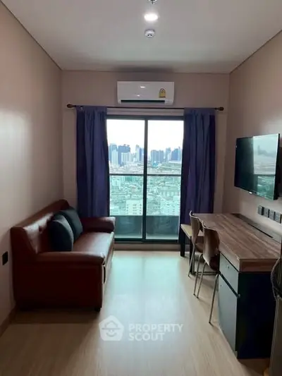 Modern living room with city view, featuring a leather sofa and wall-mounted TV.