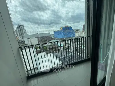 Modern balcony with city view, perfect for urban living enthusiasts.