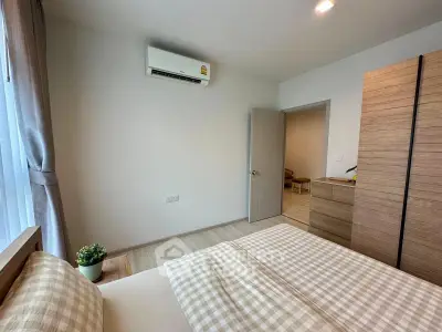 Cozy bedroom with modern decor and natural light