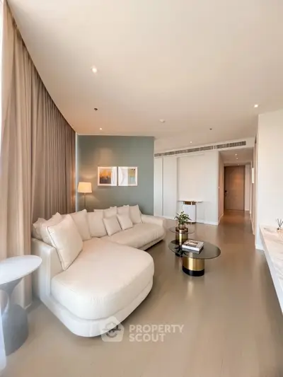Luxurious modern living room with elegant decor and spacious seating area