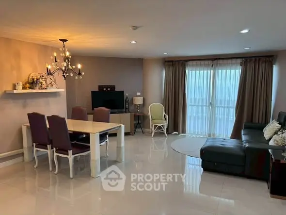 Spacious living room with elegant dining area and modern decor