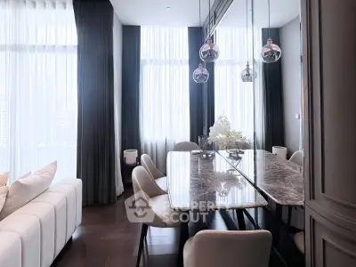 Luxurious modern dining room with elegant marble table and chic lighting in high-rise apartment.
