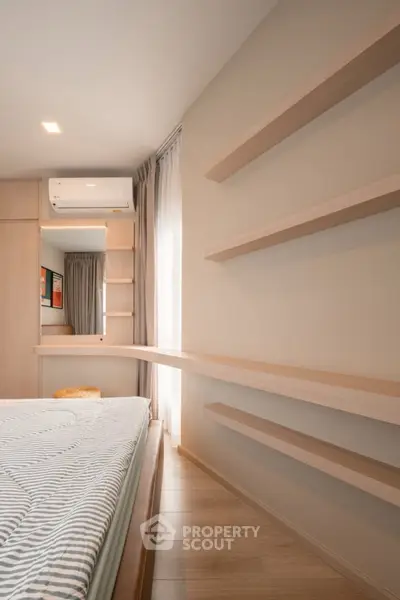 Modern bedroom with minimalist wooden shelves and air conditioning
