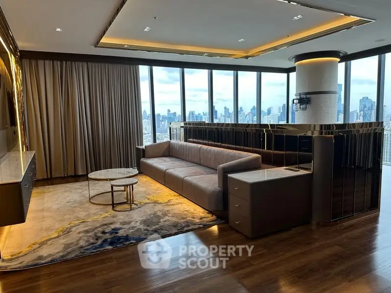 Luxurious living room with panoramic city views and elegant modern furnishings.