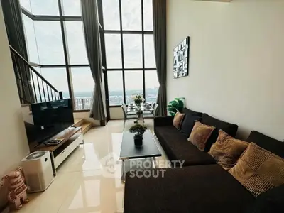 Luxurious living room with panoramic city view and modern decor