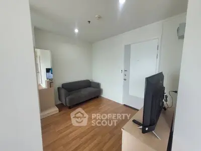 Cozy living room with modern decor and wooden flooring