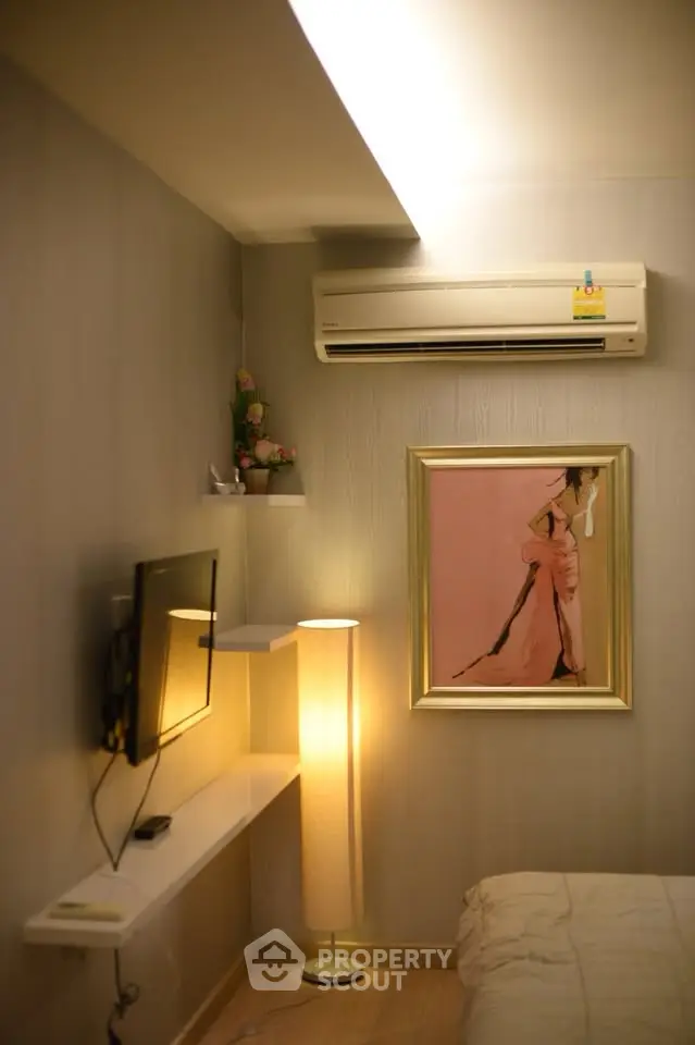 Cozy bedroom with modern decor and air conditioning