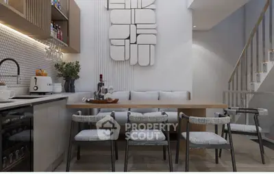 Modern kitchen with stylish dining area and contemporary decor