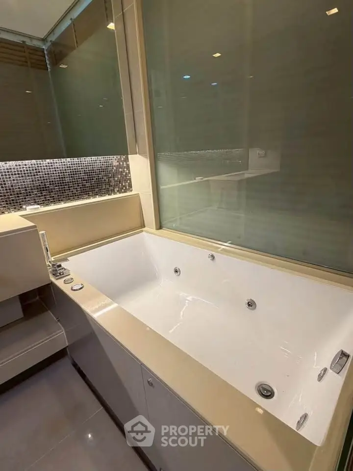 Luxurious bathroom with modern bathtub and elegant design features.