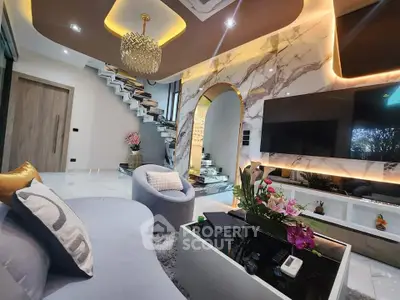 Luxurious modern living room with elegant decor and stylish staircase