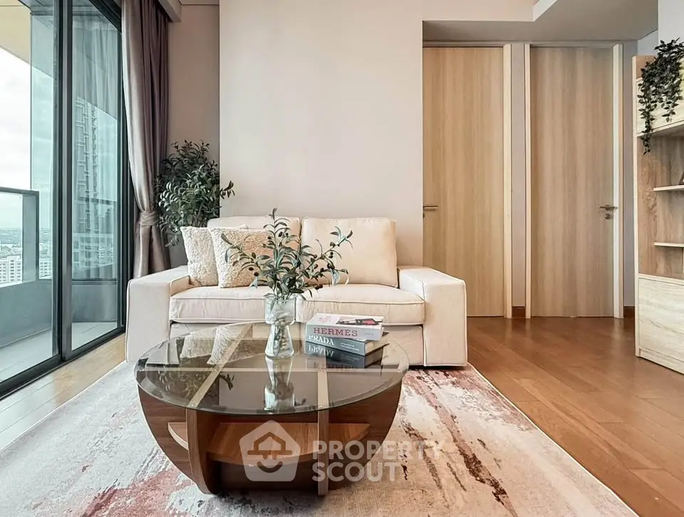 Stylish living room with modern decor and balcony view in urban apartment