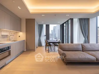 Luxurious modern living room with open kitchen and stunning city view, featuring sleek furniture and ambient lighting.