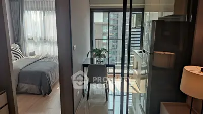 Modern apartment interior with cozy bedroom and stylish study area, featuring large windows and natural light.