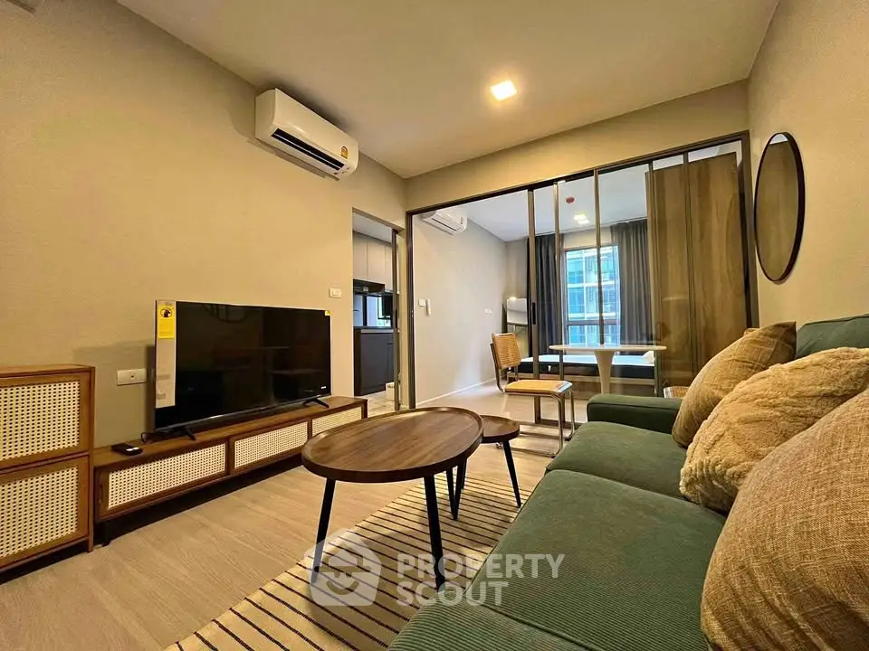 Modern living room with stylish furniture and open layout in a contemporary apartment.