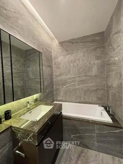 Luxurious modern bathroom with elegant marble tiles and sleek fixtures