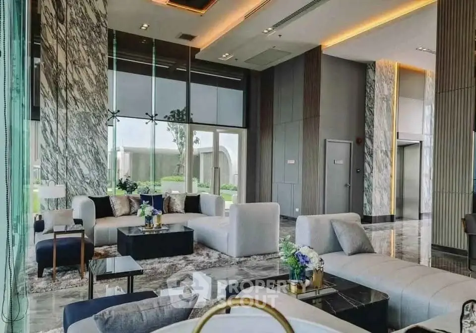 Luxurious modern living room with marble accents and plush seating in a high-end property.