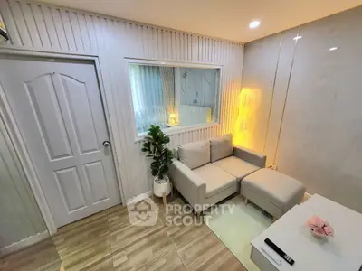 Cozy modern living room with stylish decor and comfortable seating