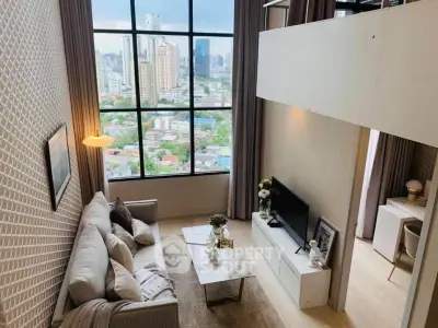 Stunning loft-style living room with city view, high ceilings, and modern decor.