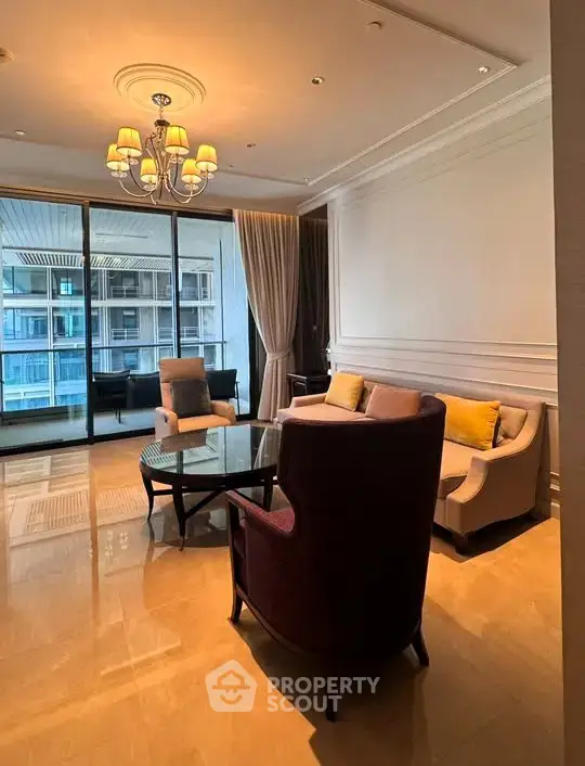 Luxurious living room with elegant furniture and large windows offering a stunning view.