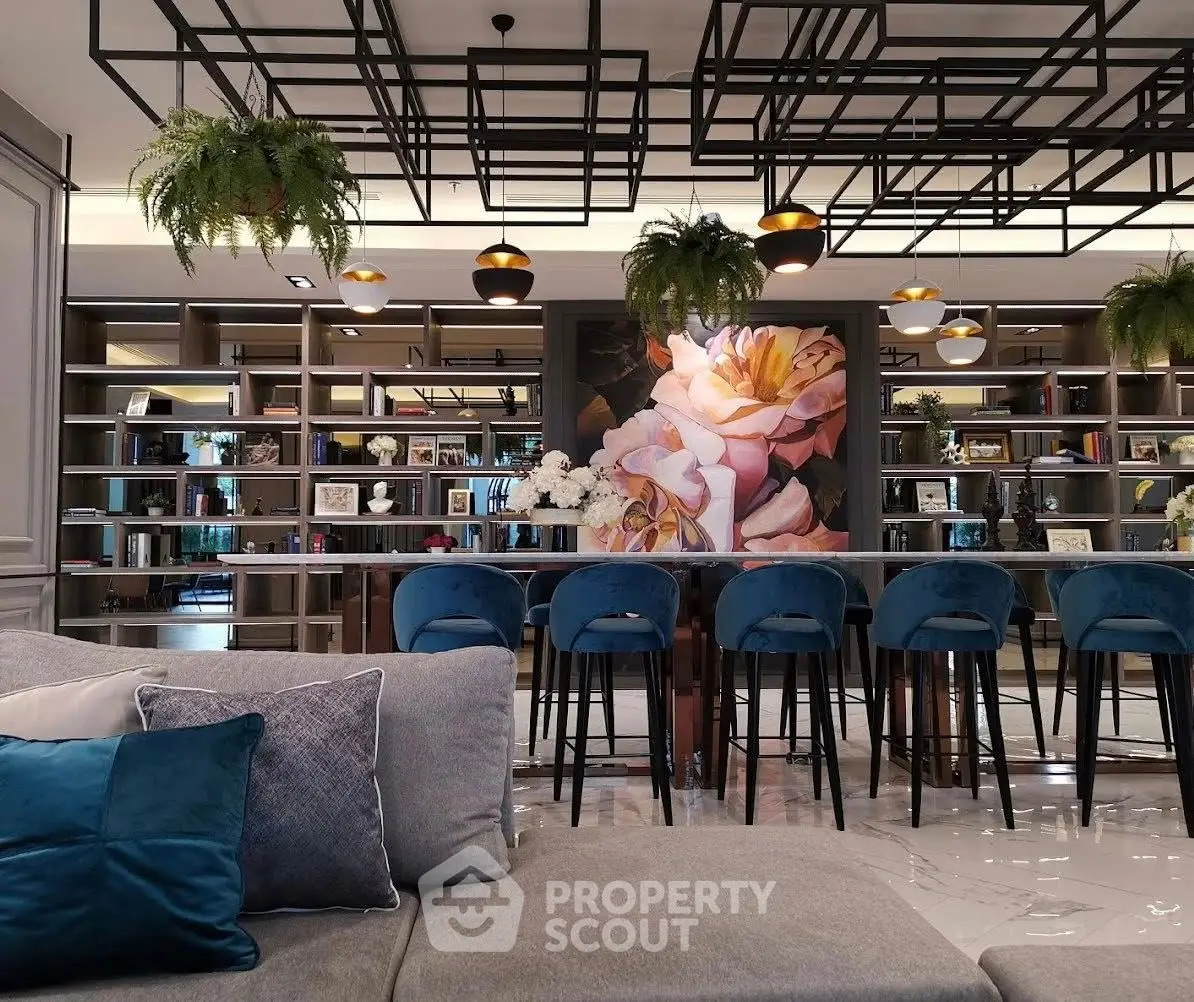 Luxurious modern living room with elegant decor and stylish furniture, featuring a stunning floral mural and plush seating.