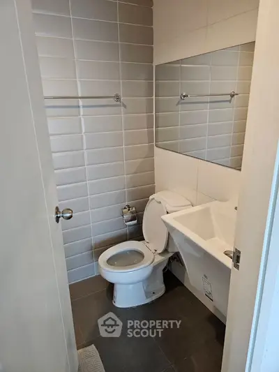 Modern bathroom with sleek tiles and contemporary fixtures
