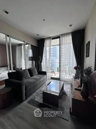 Modern living room with balcony view in high-rise apartment