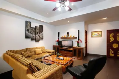 Spacious living room with elegant decor and comfortable seating in a modern home.