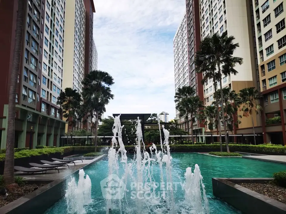 Luxurious apartment complex with stunning pool and modern architecture