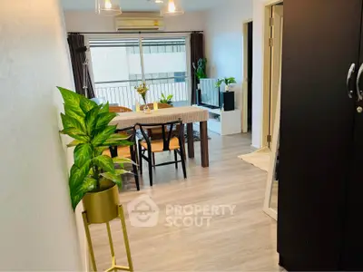 Modern dining area with stylish decor and balcony view