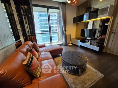 Luxurious living room with leather sofa and city view balcony in modern apartment