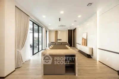 Luxurious modern living room with open layout and elegant decor