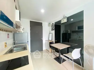 Modern kitchen with sleek design, featuring open layout and contemporary appliances.