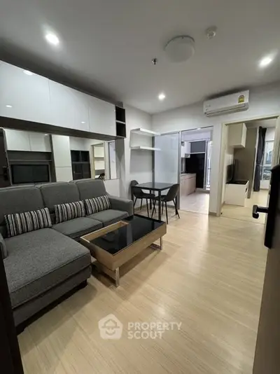 Modern living room with stylish furniture and open layout in a contemporary apartment.