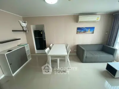 Modern living room with sleek furniture and air conditioning