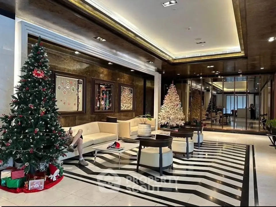 Luxurious lobby with festive Christmas decor and elegant seating area